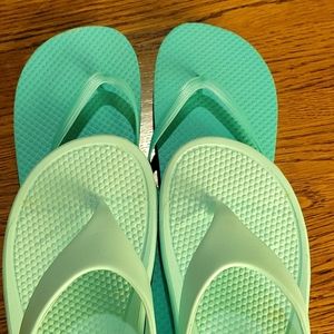 Totes flip flops + aqua flip fops